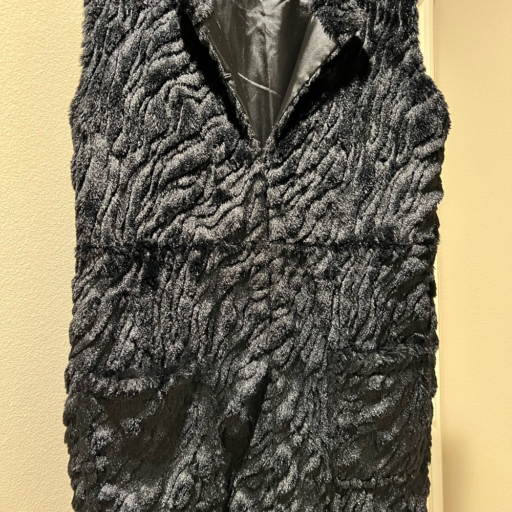 Black fur long vest